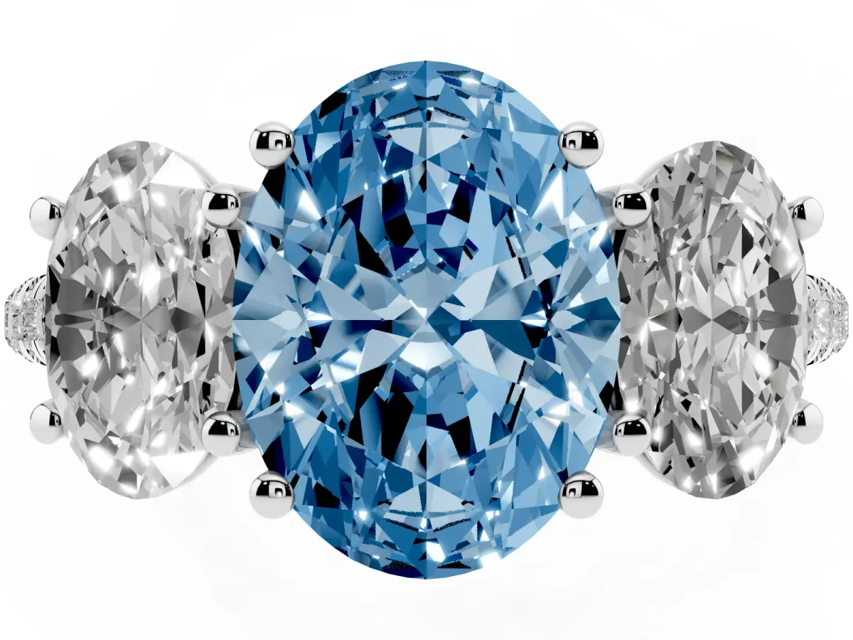 Fancy Blue Three-Stone Oval Cut Diamond Ring with Round Pavé Band and Prong Setting Silver