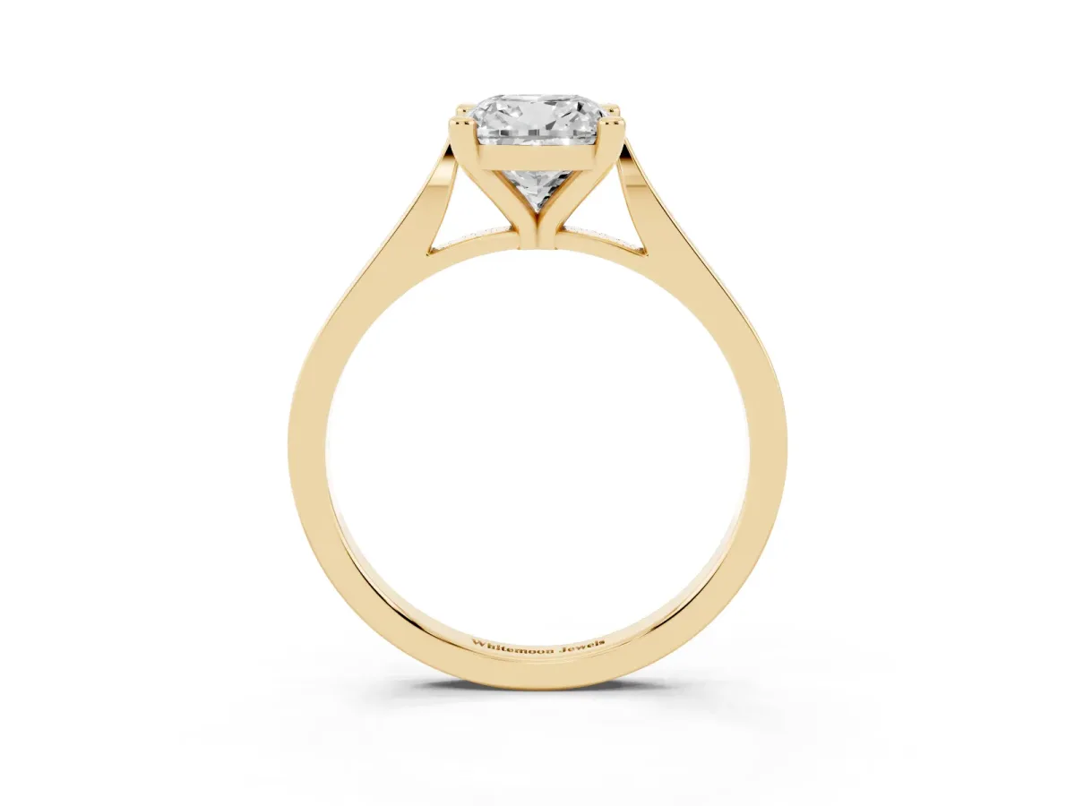 Cushion Cut Solitaire Diamond Ring with Four-Prong Setting and Tapered Band Yellow gold