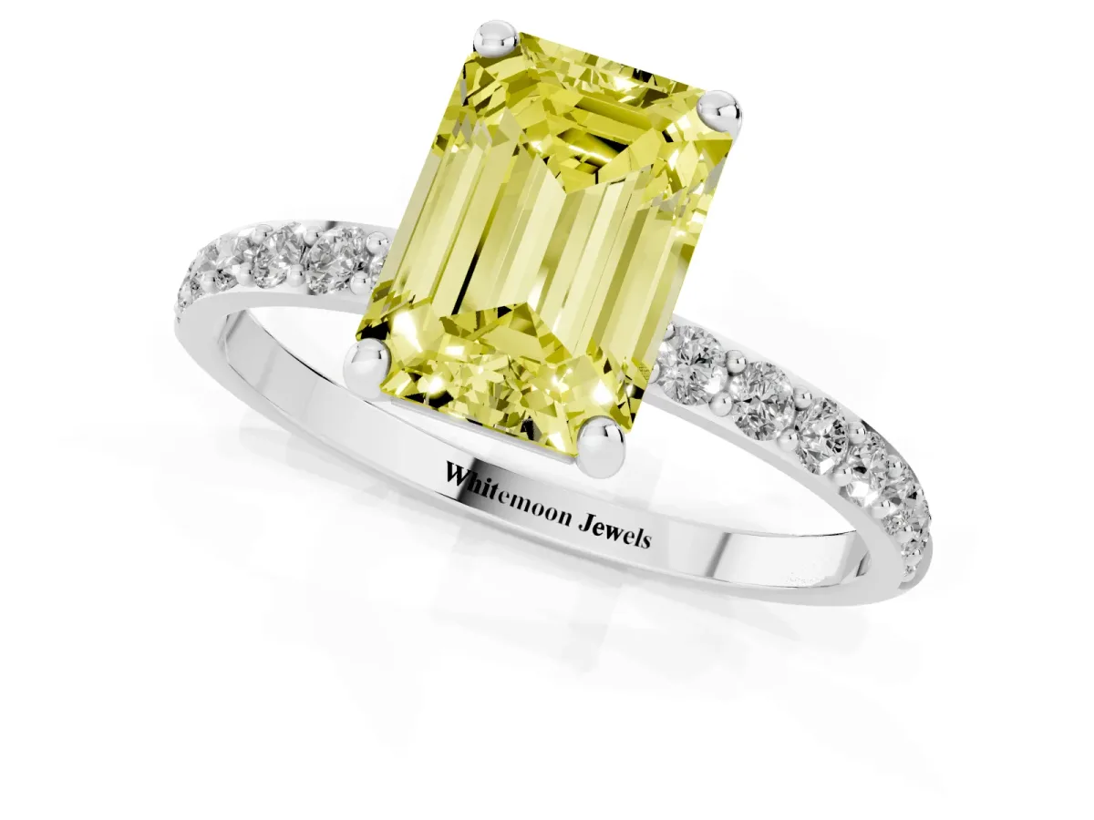 Fancy Yellow Emerald Cut Diamond Solitaire Ring with Round Pavé Band and Prong Setting Silver