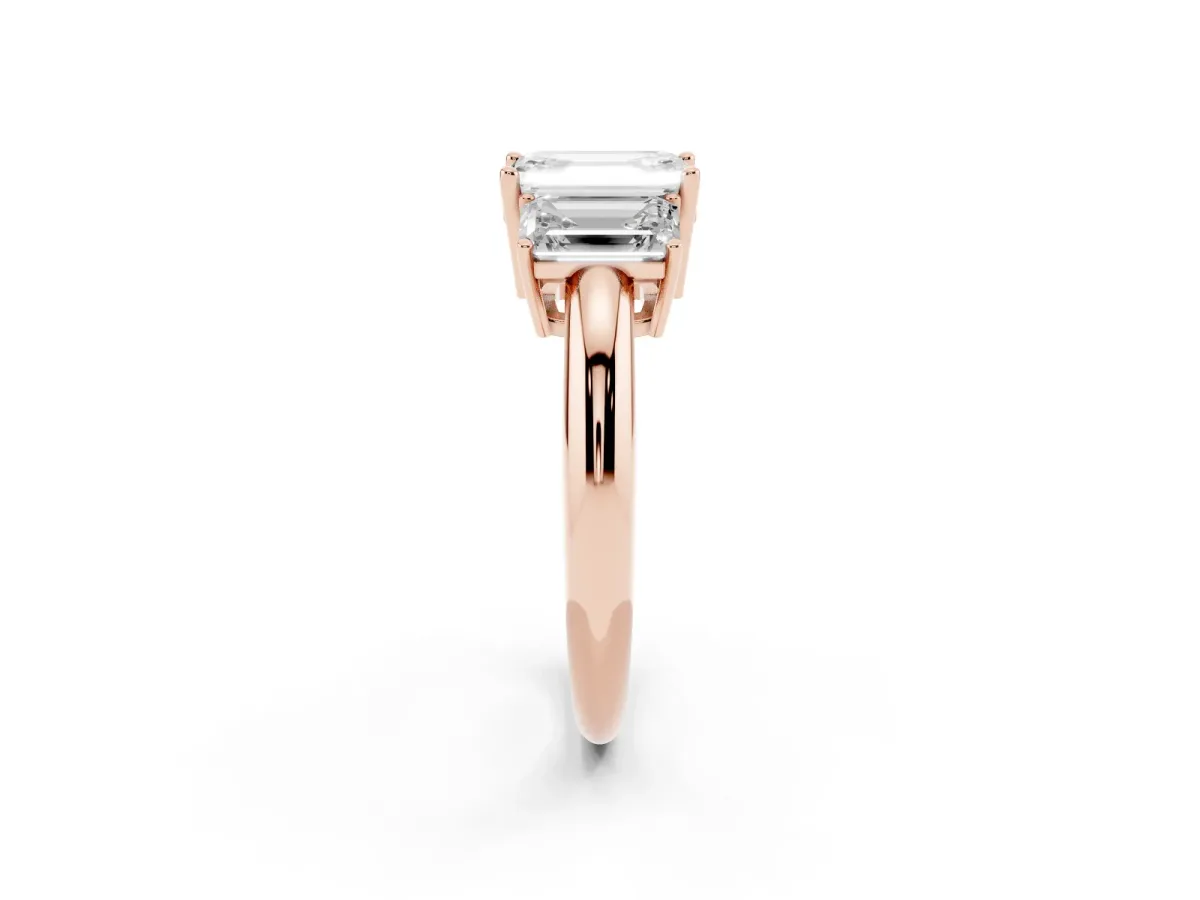 Three-Stone Emerald Cut Cut Diamond Engagement Ring with Prong Setting on a White Gold Band Rose gold