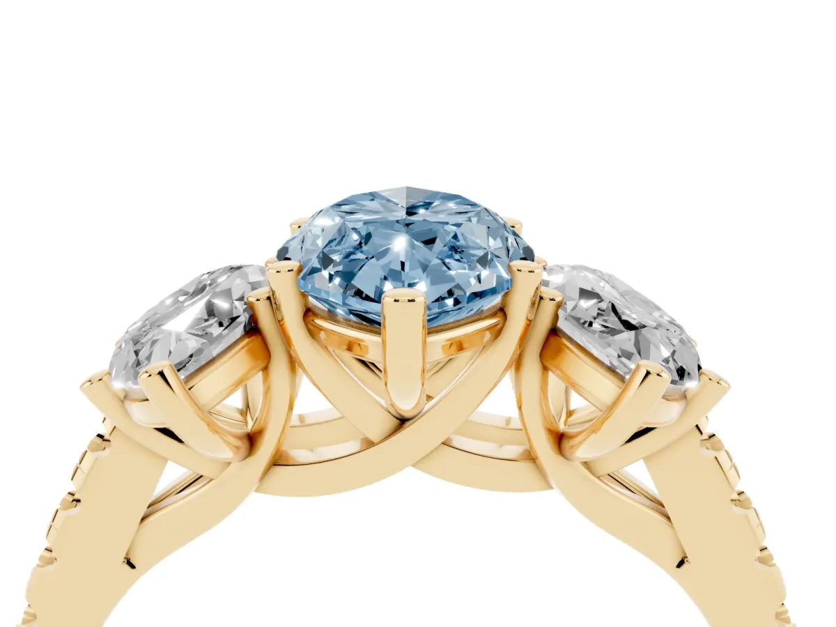 Fancy Blue Three-Stone Marquise Cut Diamond Ring with Round Pavé Band and Prong Setting Yellow gold