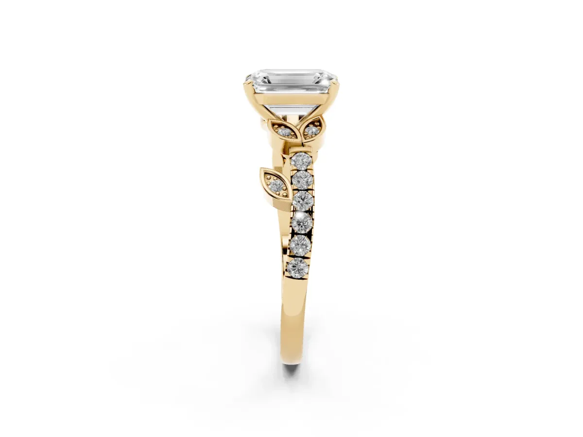 Emerald Cut Solitaire Leaf-Inspired Diamond Ring with Pavé Band and Four-Prong Setting Yellow gold