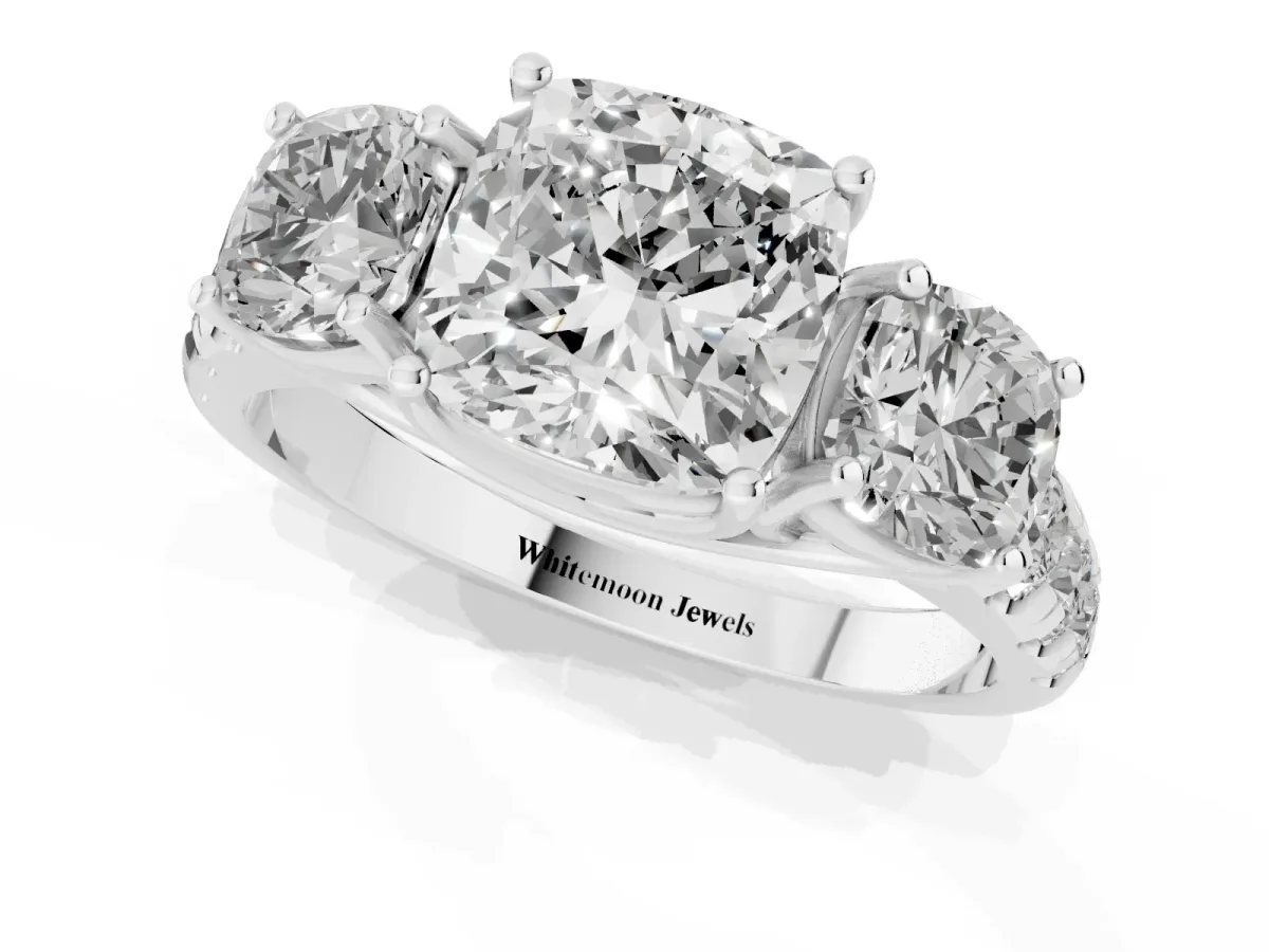 Three-Stone Cushion Cut Diamond Pavé Band with Prong Setting Platinum
