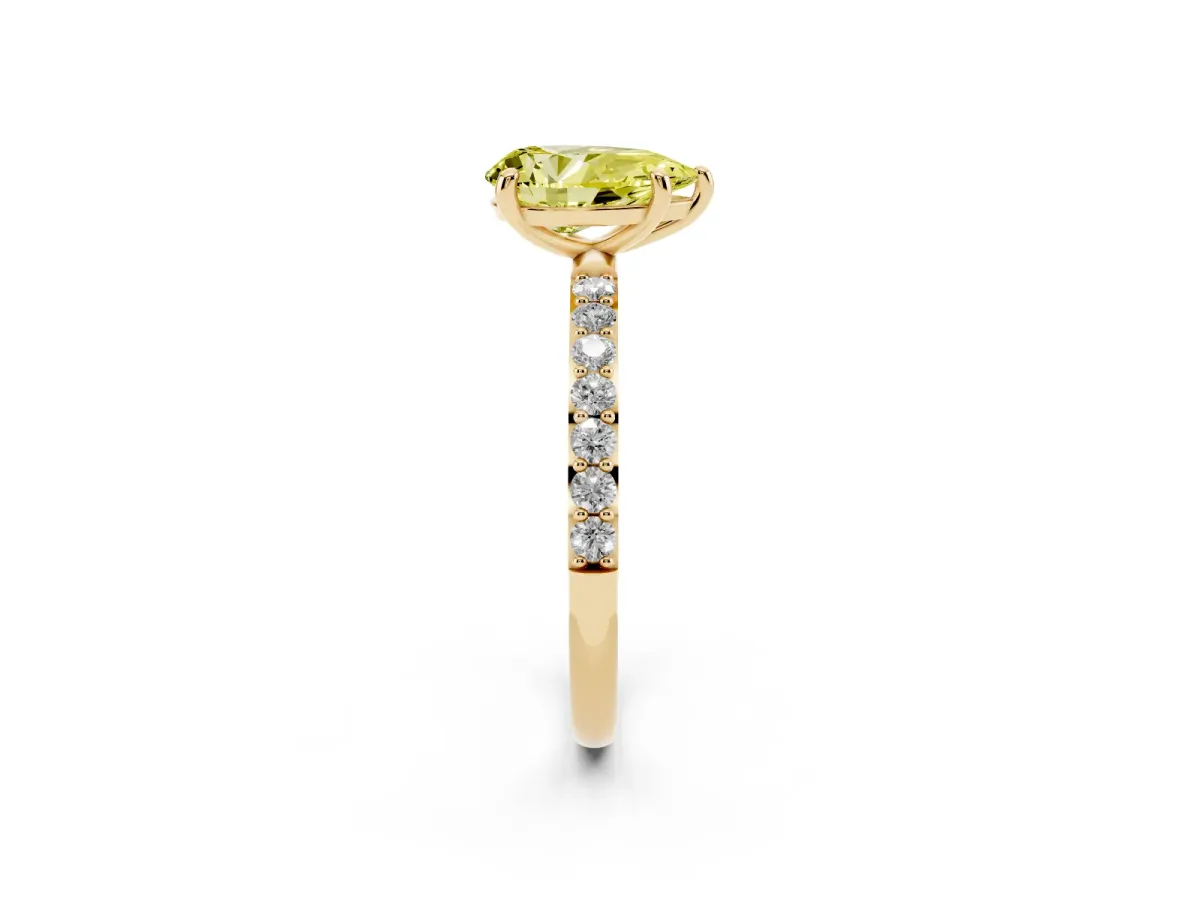 Fancy Yellow Pear Cut Diamond Solitaire Ring with Round Pavé Band and Prong Setting Yellow gold