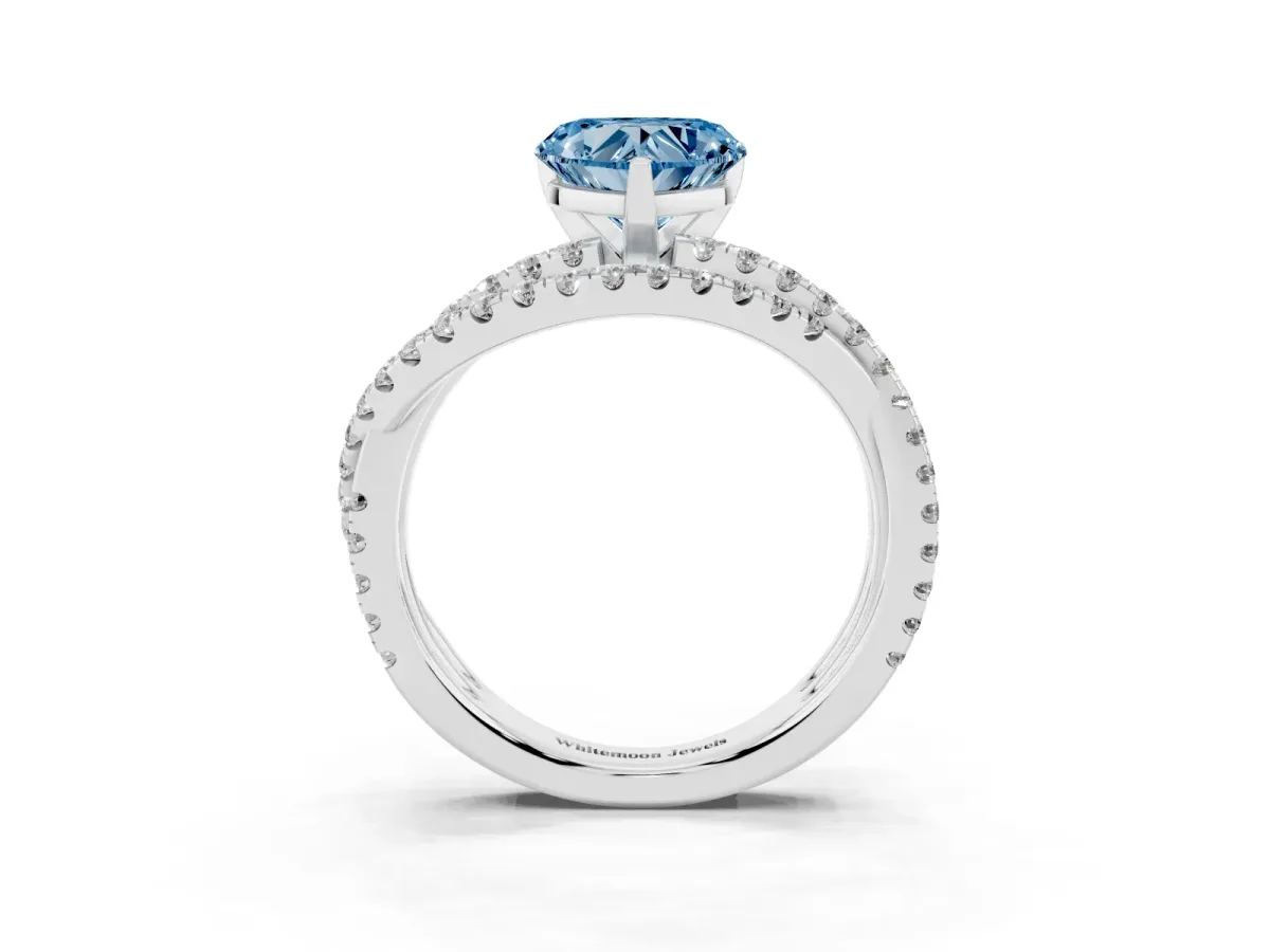 Fancy Blue Heart Cut Solitaire Twist Band with Pavé Setting and Four-Prong Setting Silver