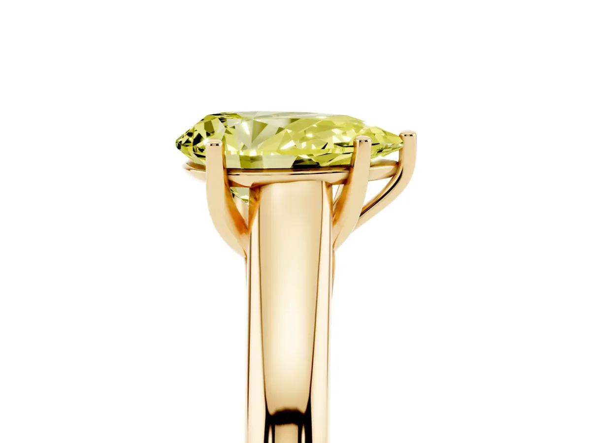 Fancy Yellow Pear Cut Solitaire Engagement Ring with Tapered Band and Four-Prong Setting Yellow gold