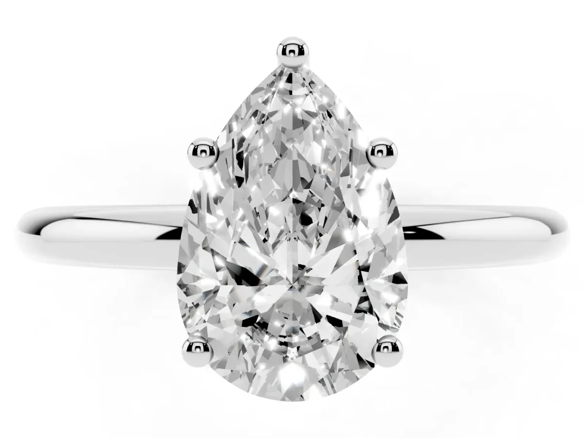 Pear Cut Cut Solitaire Engagement Ring with Four-Prong Setting and Classic Band Silver