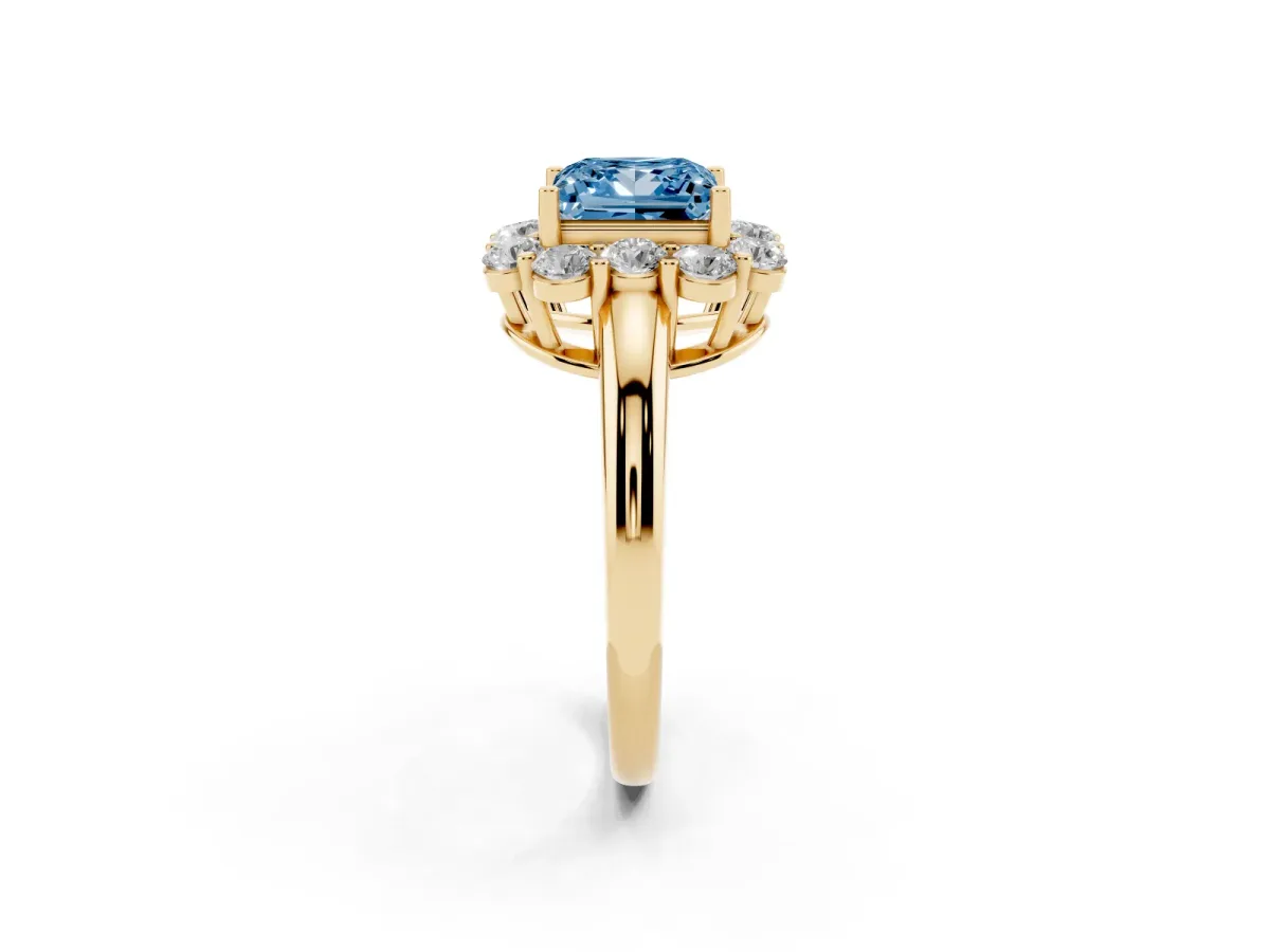 Fancy Blue Princess Cut Halo Milgrain Solitaire with Bezel Set Side Stones and Pave Band Yellow gold