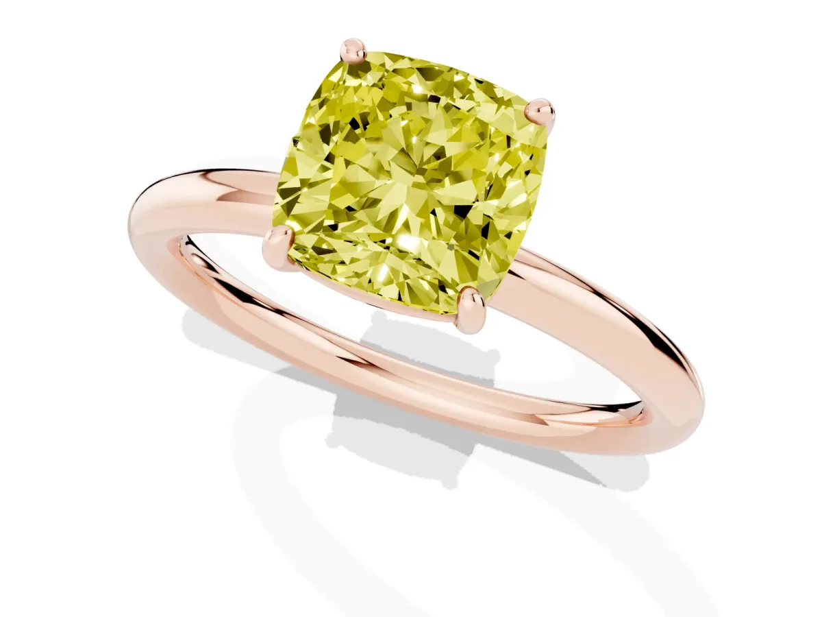 Fancy Yellow Cushion Cut Solitaire Diamond Ring with Four-Prong Setting on a Plain Band Rose gold