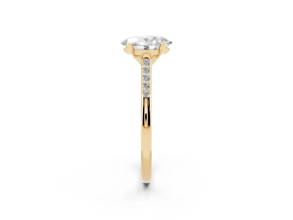 Oval Cut Diamond Solitaire Ring with Channel Set Round Band and Prong Setting Yellow gold