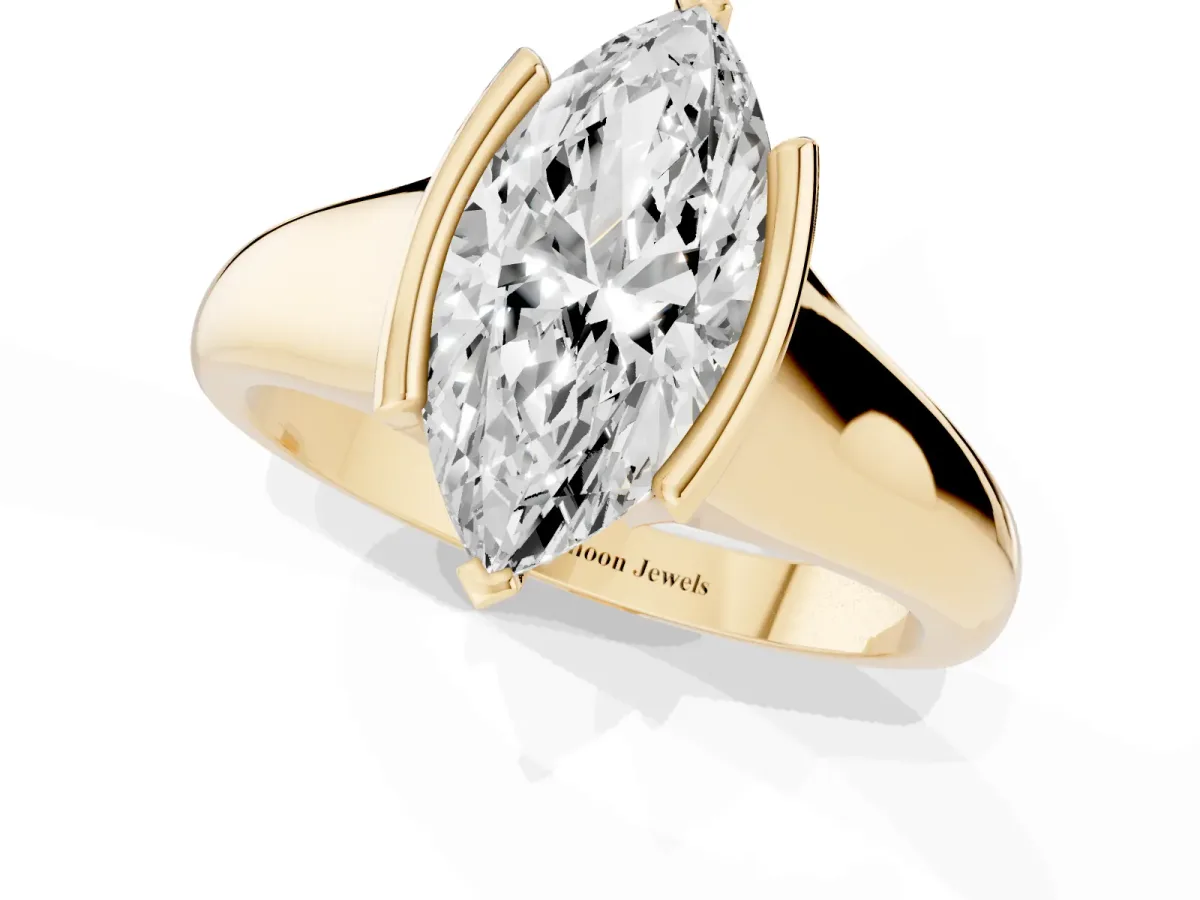 Marquise Cut Solitaire Tension Set Diamond Ring with Split Shank Band Yellow gold