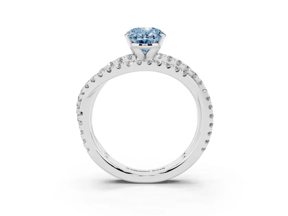 Fancy Blue Oval Cut Solitaire Twist Band with Pavé Setting and Four-Prong Setting Platinum