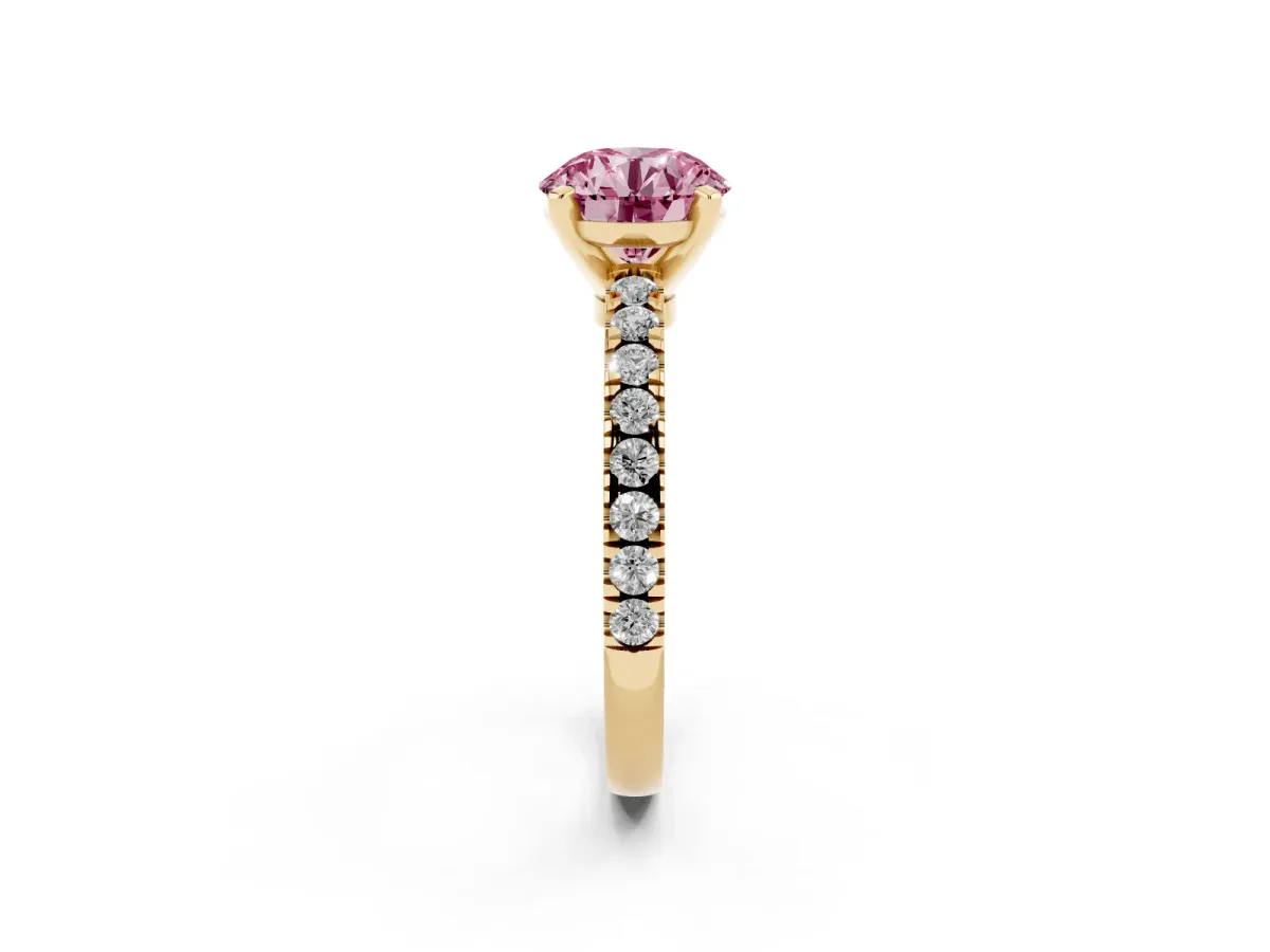 Fancy Pink Round Cut Solitaire Diamond with Pavé Band and Four-Prong Setting Yellow gold