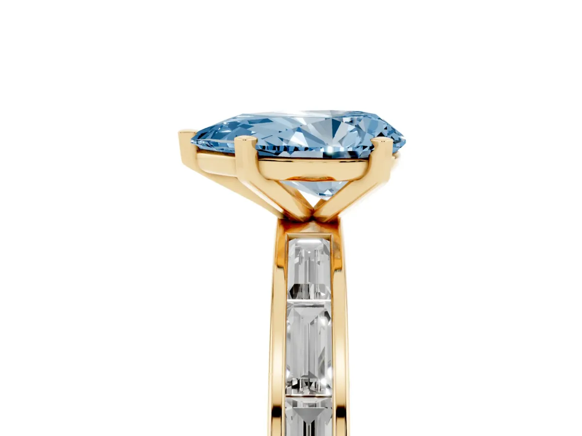 Fancy Blue Pear Cut Solitaire Diamond Ring with Channel-Set Baguette Band and Four-Prong Setting Yellow gold