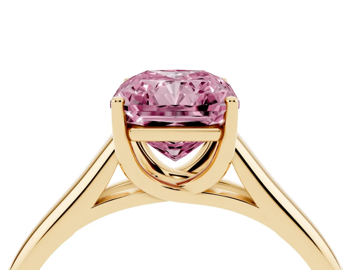 Fancy Pink Radiant Cut Solitaire Engagement Ring with Tapered Band and Four-Prong Setting Yellow gold