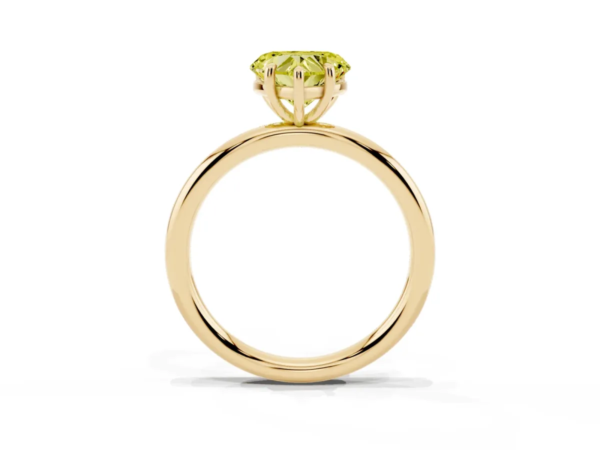 Fancy Yellow Heart Cut Solitaire Diamond Ring with Four-Prong Setting on a Plain Band Yellow gold