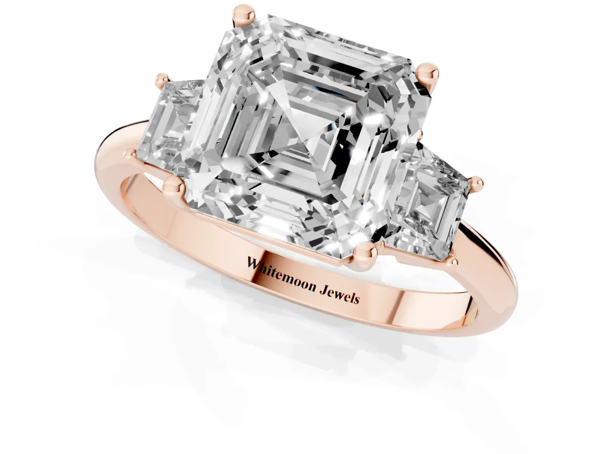 Asscher Cut Diamond Three-Stone Ring with Trapezoid Side Stones and Prong Setting Rose gold