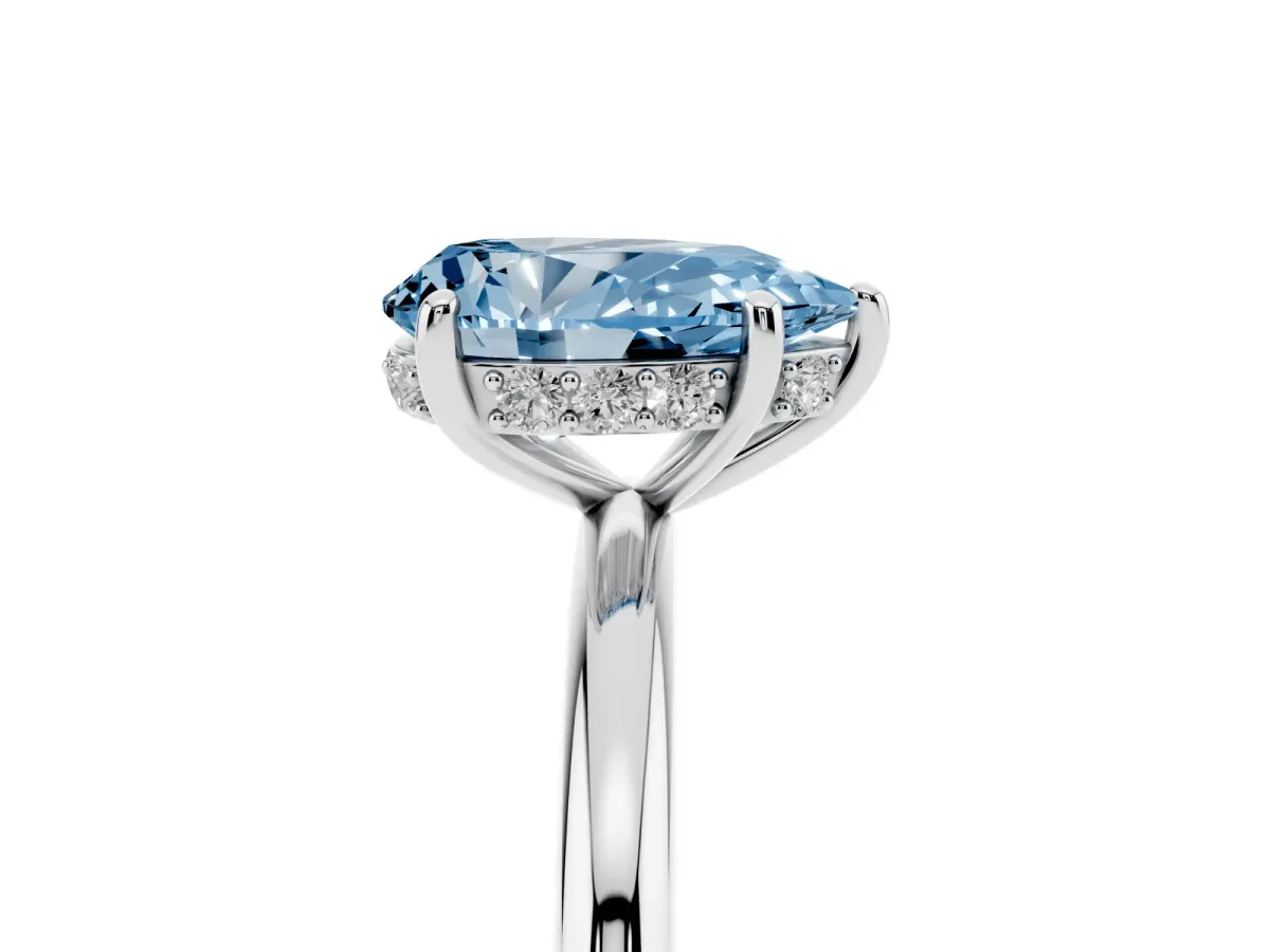 Fancy Blue Pear Cut Solitaire Diamond Ring with a Classic Band and Four-Prong Setting Platinum