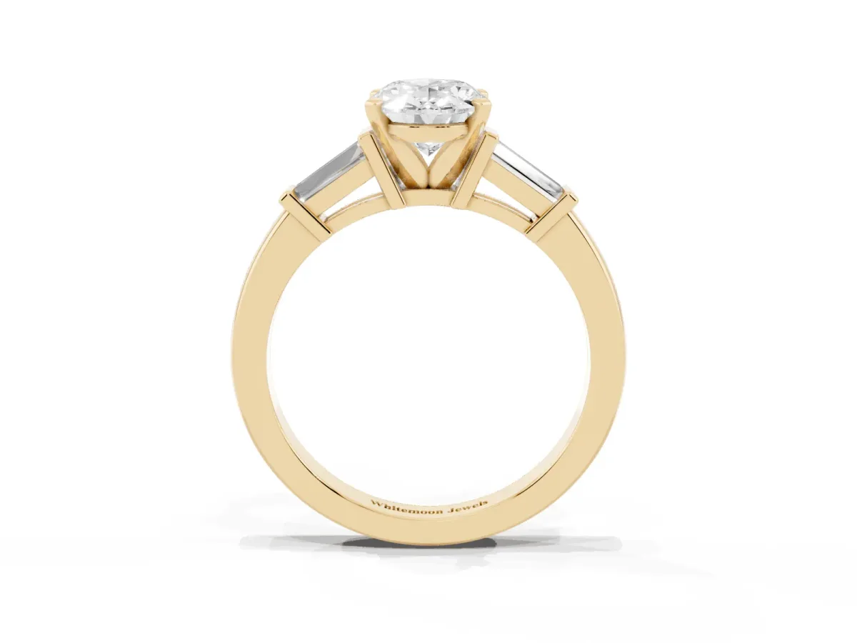 Oval Cut Cut Diamond Solitaire Ring with Tapered Baguette Accents and Four-Prong Setting Yellow gold