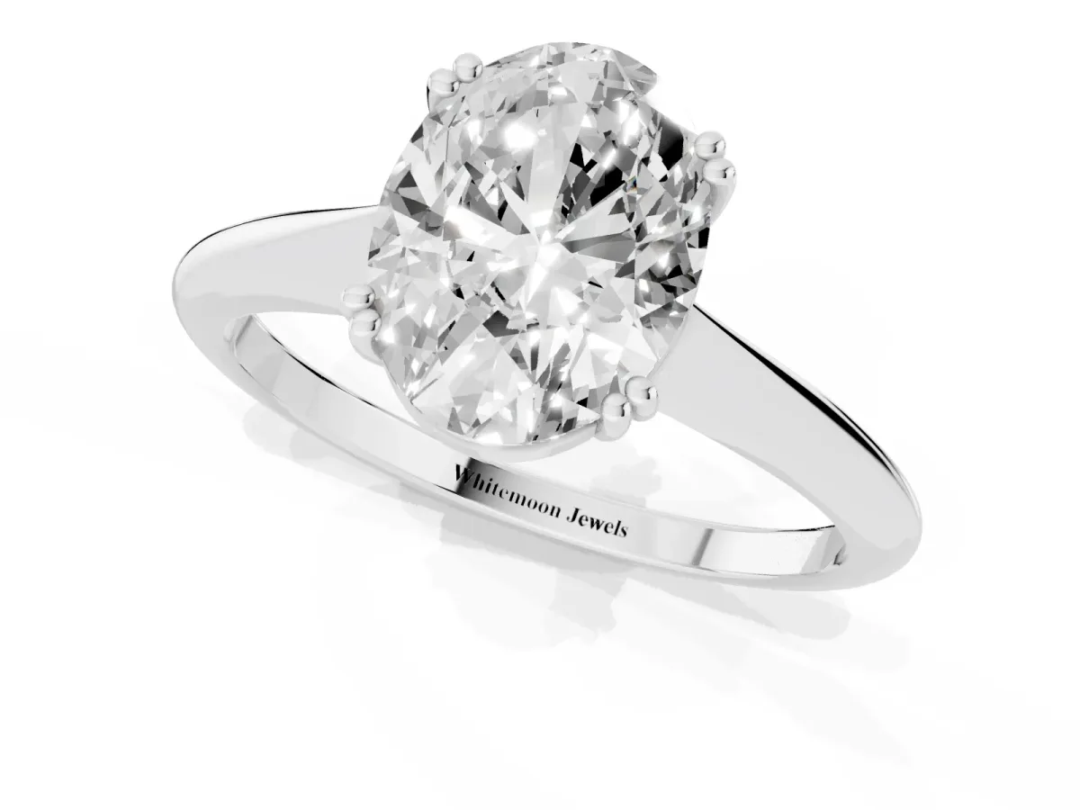 Oval Cut Solitaire Diamond Ring with Six-Prong Setting and Classic Band Silver