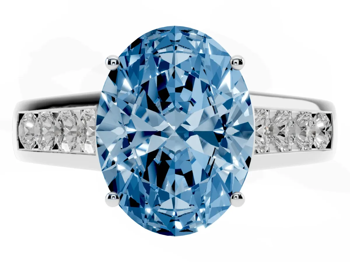 Fancy Blue Oval Cut Brilliant Channel-Set Solitaire Ring with Four-Prong Setting Silver