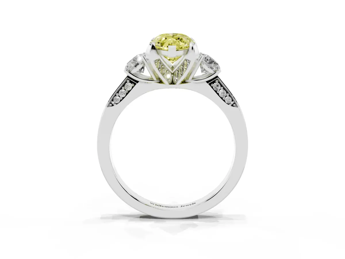 Fancy Yellow Marquise Cut Brilliant Three-Stone Diamond Ring with Pavé Band and Four-Prong Setting Platinum