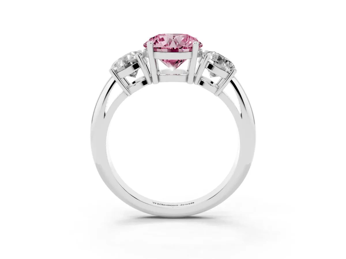 Fancy Pink Three-Stone Round Cut Cut Diamond Engagement Ring with Prong Setting on a White Gold Band Silver