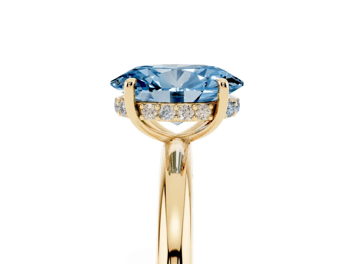 Fancy Blue Oval Cut Diamond Solitaire Ring with Thin Band and Four-Prong Setting Yellow gold
