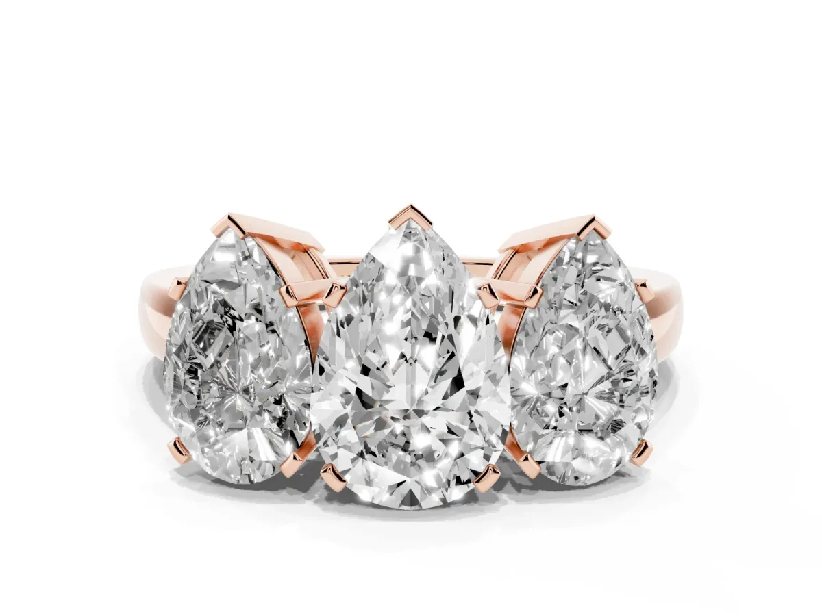 Three-Stone Pear Cut Cut Diamond Ring with Channel Set Band and Four-Prong Setting Rose gold