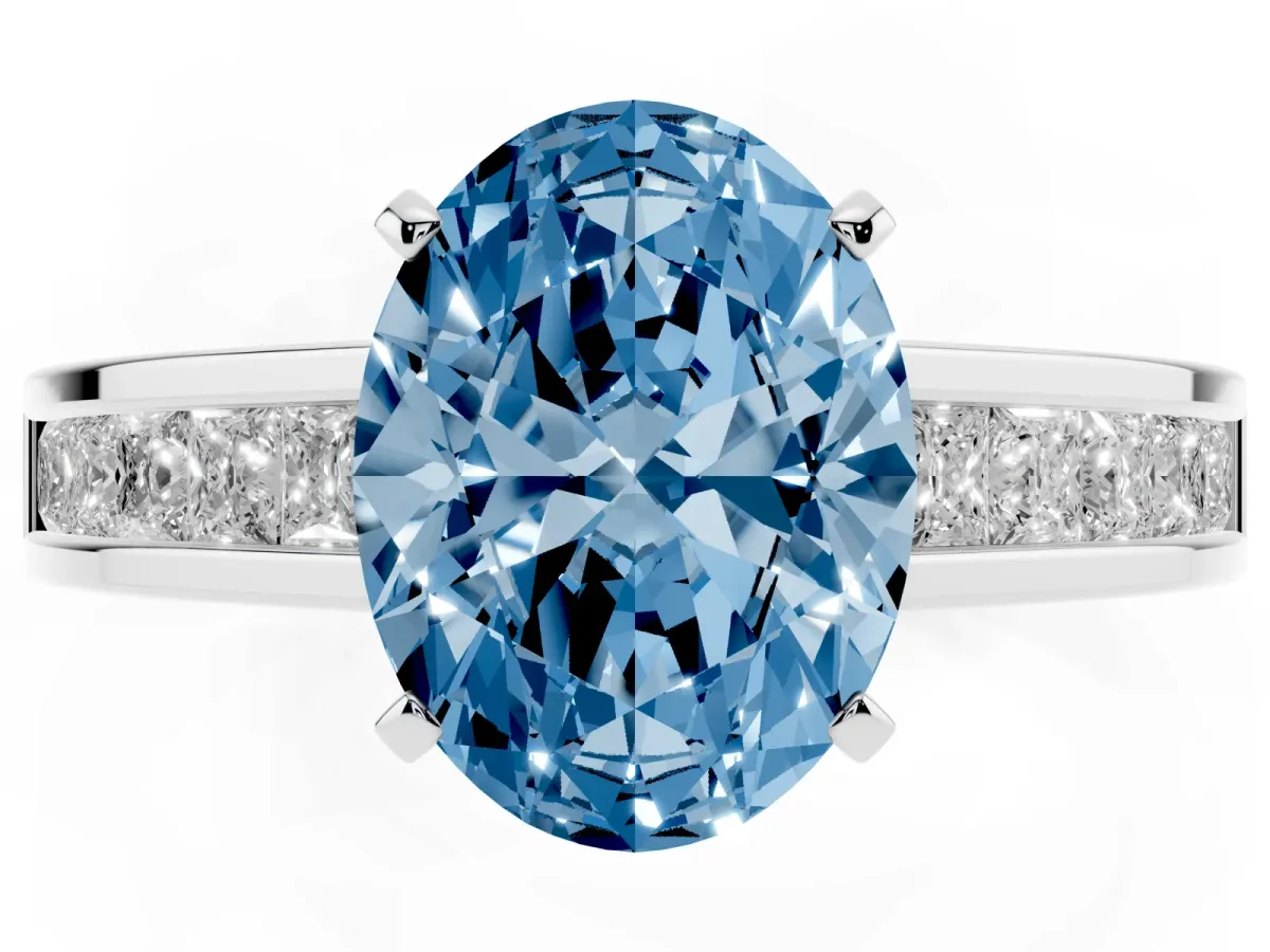 Fancy Blue Oval Cut Solitaire Diamond Ring with Channel-Set Band and Four-Prong Setting Silver
