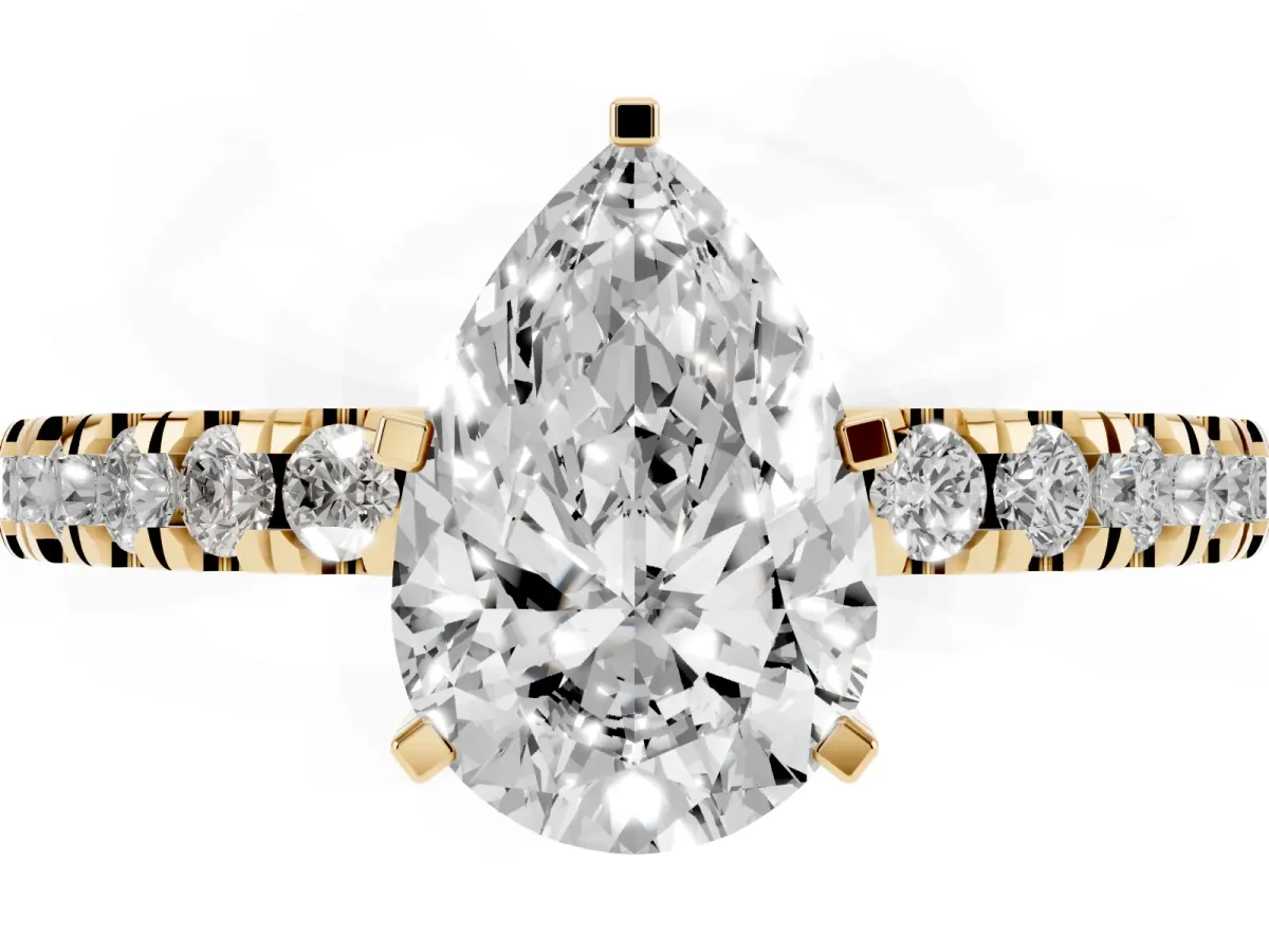 Pear Cut Solitaire Diamond with Pavé Band and Four-Prong Setting Yellow gold