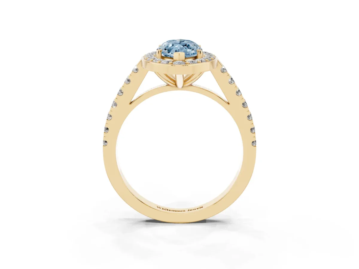 Fancy Blue Marquise Cut Diamond Halo Ring with Round Pavé Split Shank and Prong Setting Yellow gold