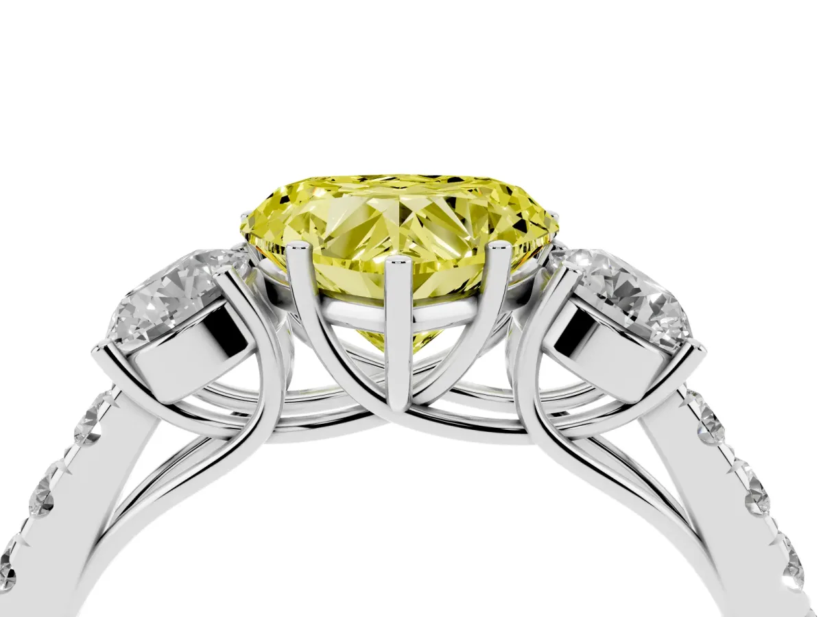 Fancy Yellow Heart Cut Cut Diamond Three-Stone Ring with Round Side Stones and Pavé Band Platinum