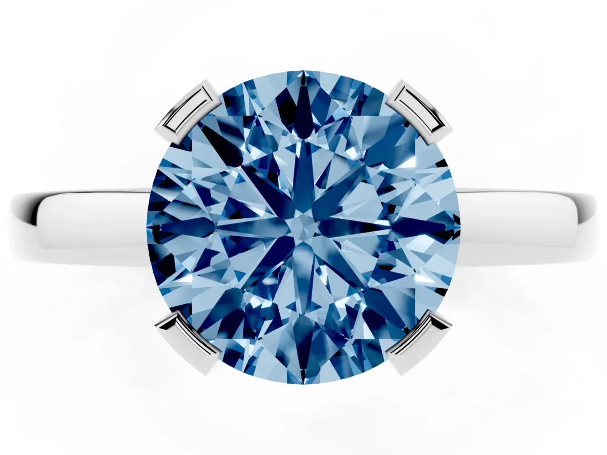 Fancy Blue Round Cut Cut Solitaire Ring with Four-Prong Setting and Classic Band Silver