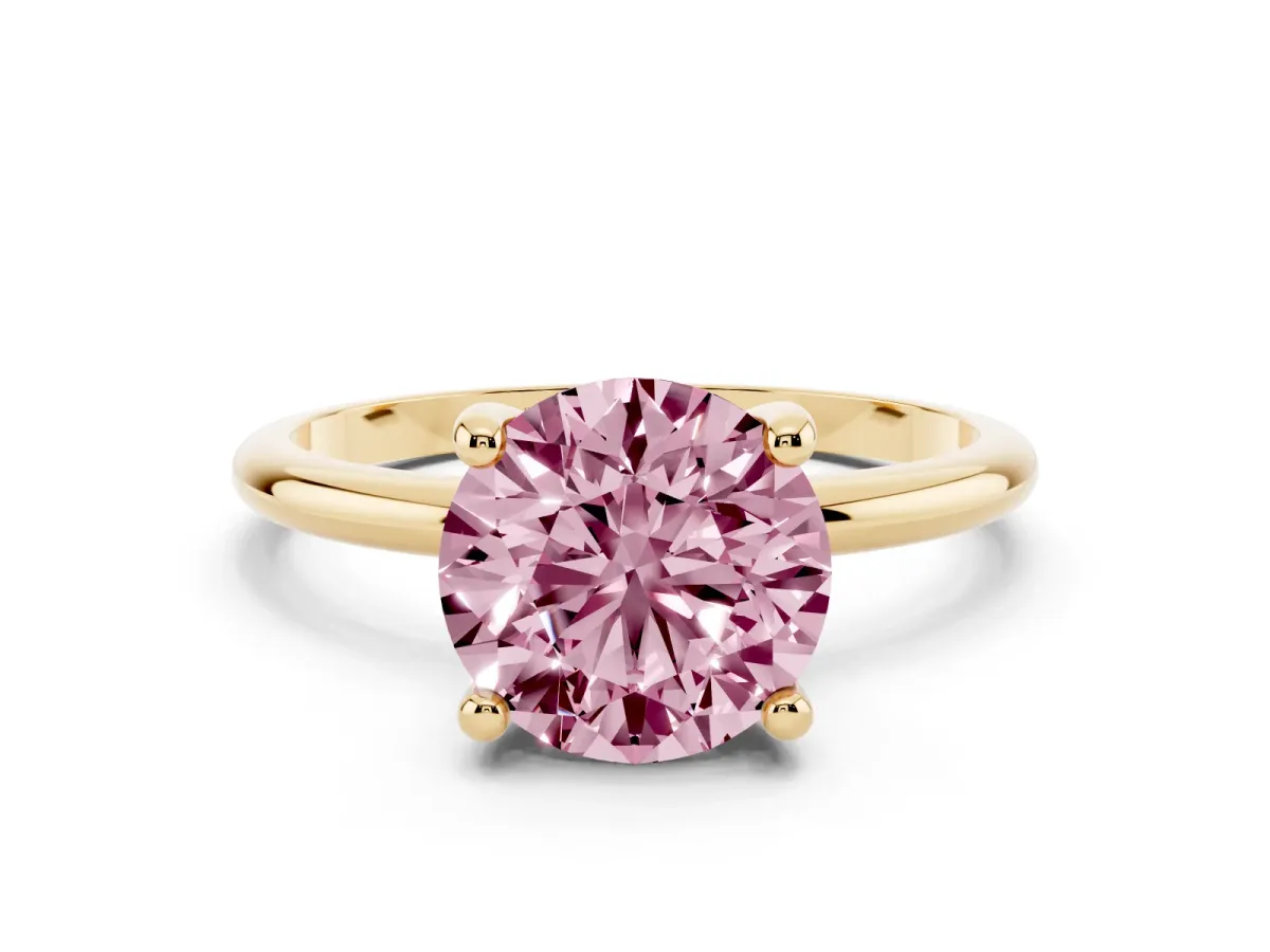Fancy Pink Round Cut Solitaire Diamond Ring with 4-Prong Setting on a Classic Band Yellow gold