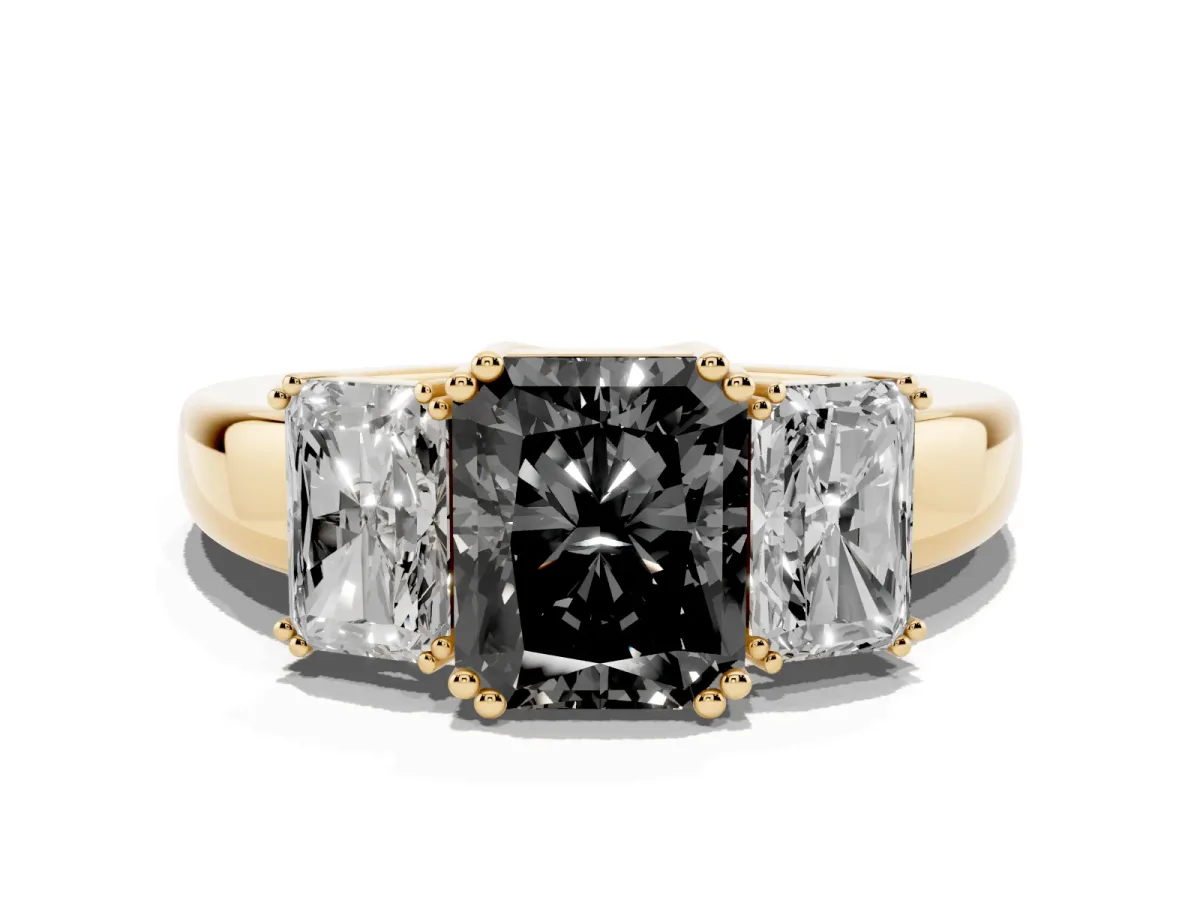 Fancy Black Three-Stone Radiant Cut Cut Diamond Ring with Channel Set Band and Four-Prong Setting Yellow gold