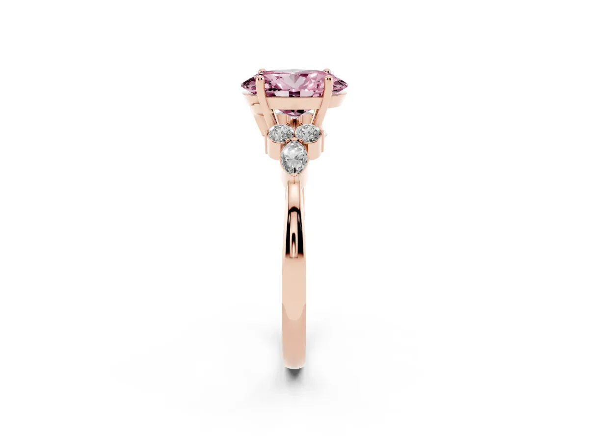 Fancy Pink Oval Cut Brilliant Diamond Solitaire Ring with Pear Side Stones and Four-Prong Setting Rose gold