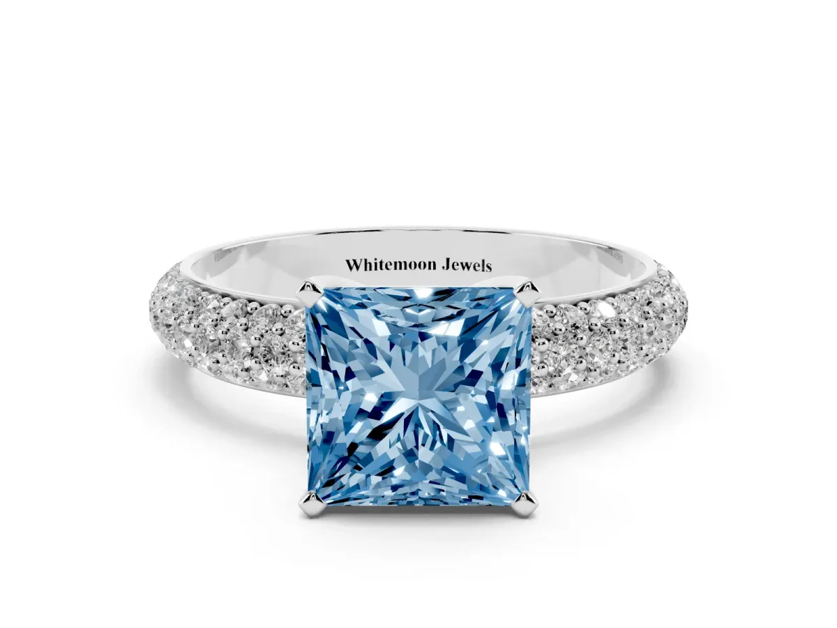 Fancy Blue Princess Cut Diamond Solitaire Ring with Prong Setting and Pavé Band Silver