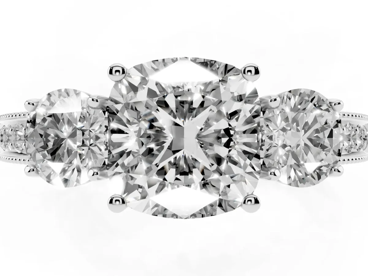 Cushion Cut Three-Stone Diamond Ring with Pavé Band and Four-Prong Setting Silver