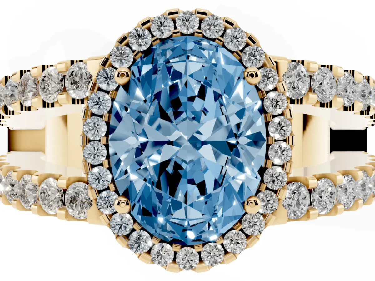 Fancy Blue Oval Cut Cut Halo Split Shank Diamond Ring with Four-Prong Setting Yellow gold