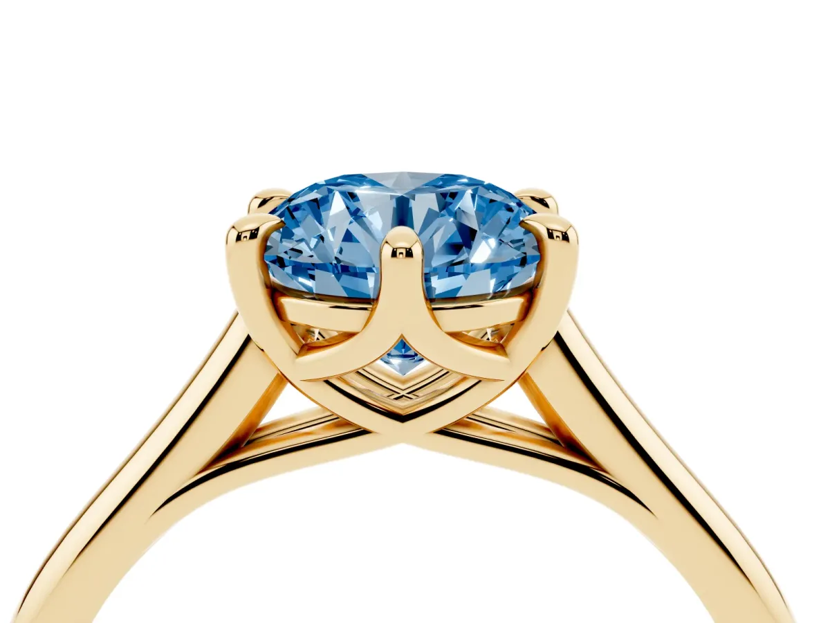 Fancy Blue Round Cut Solitaire Engagement Ring with Six-Prong Setting and Classic Band Yellow gold