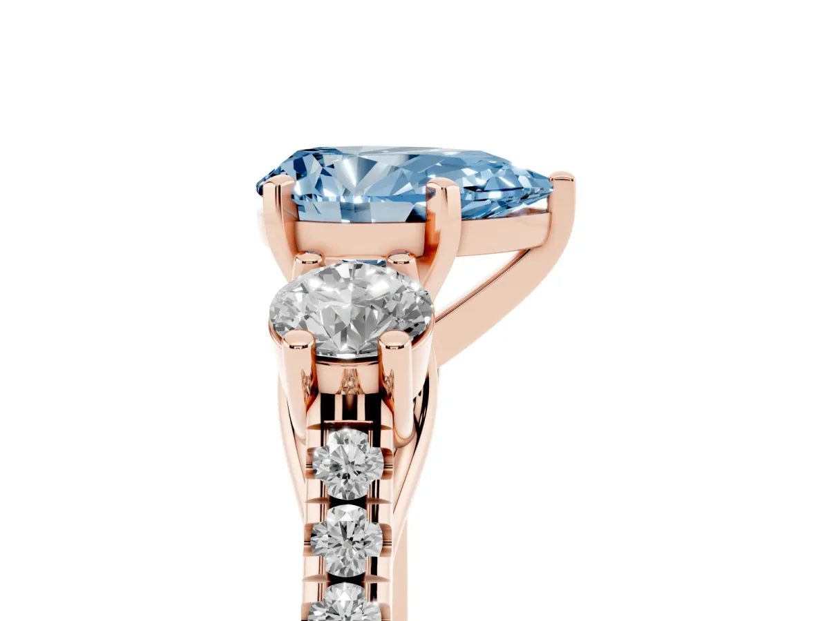 Fancy Blue Three-Stone Pear Cut Diamond Pavé Band with Four-Prong Setting Rose gold