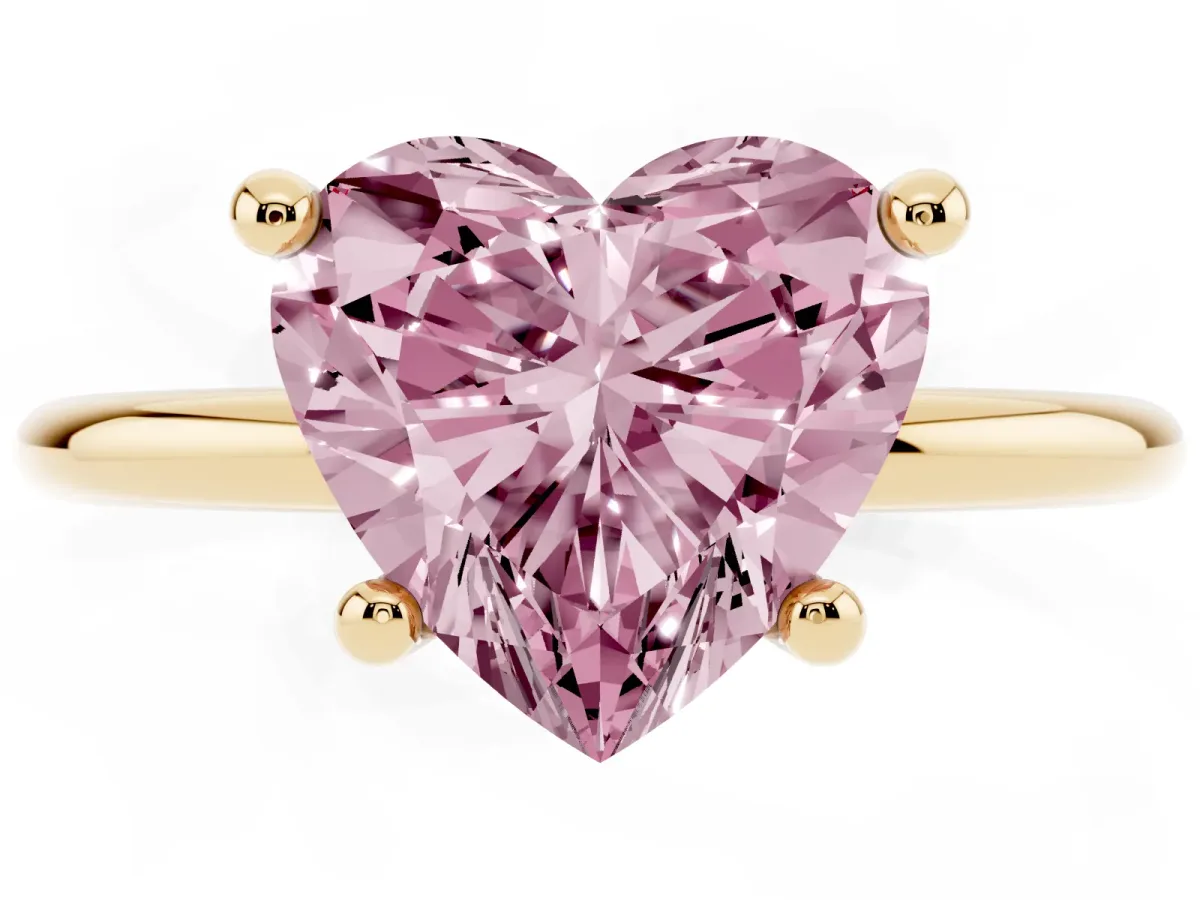 Fancy Pink Heart Cut Solitaire Diamond Ring with 4-Prong Setting on a Classic Band Yellow gold