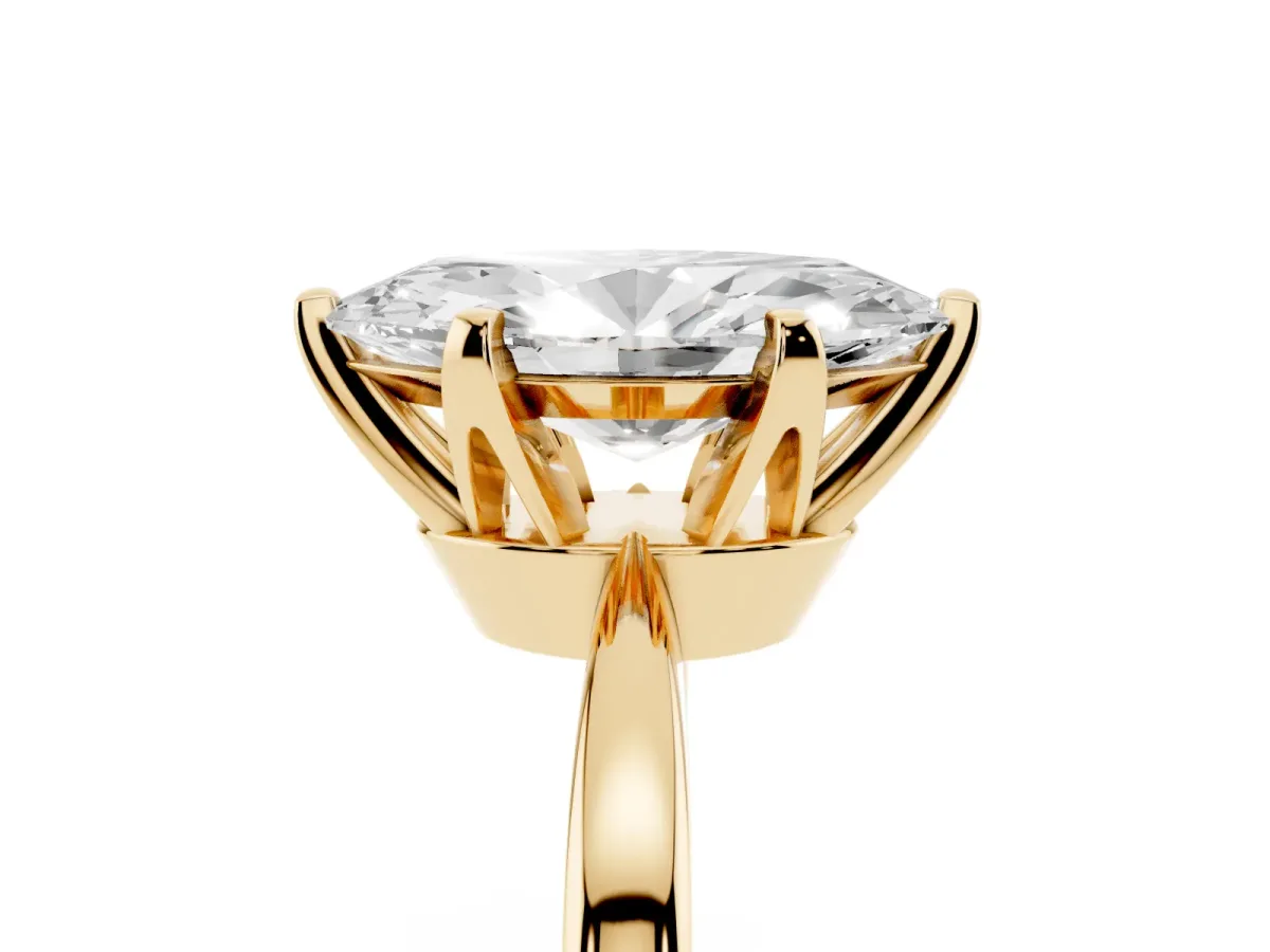 Marquise Cut Solitaire Engagement Ring with Six-Prong Setting and Tapered Band Yellow gold
