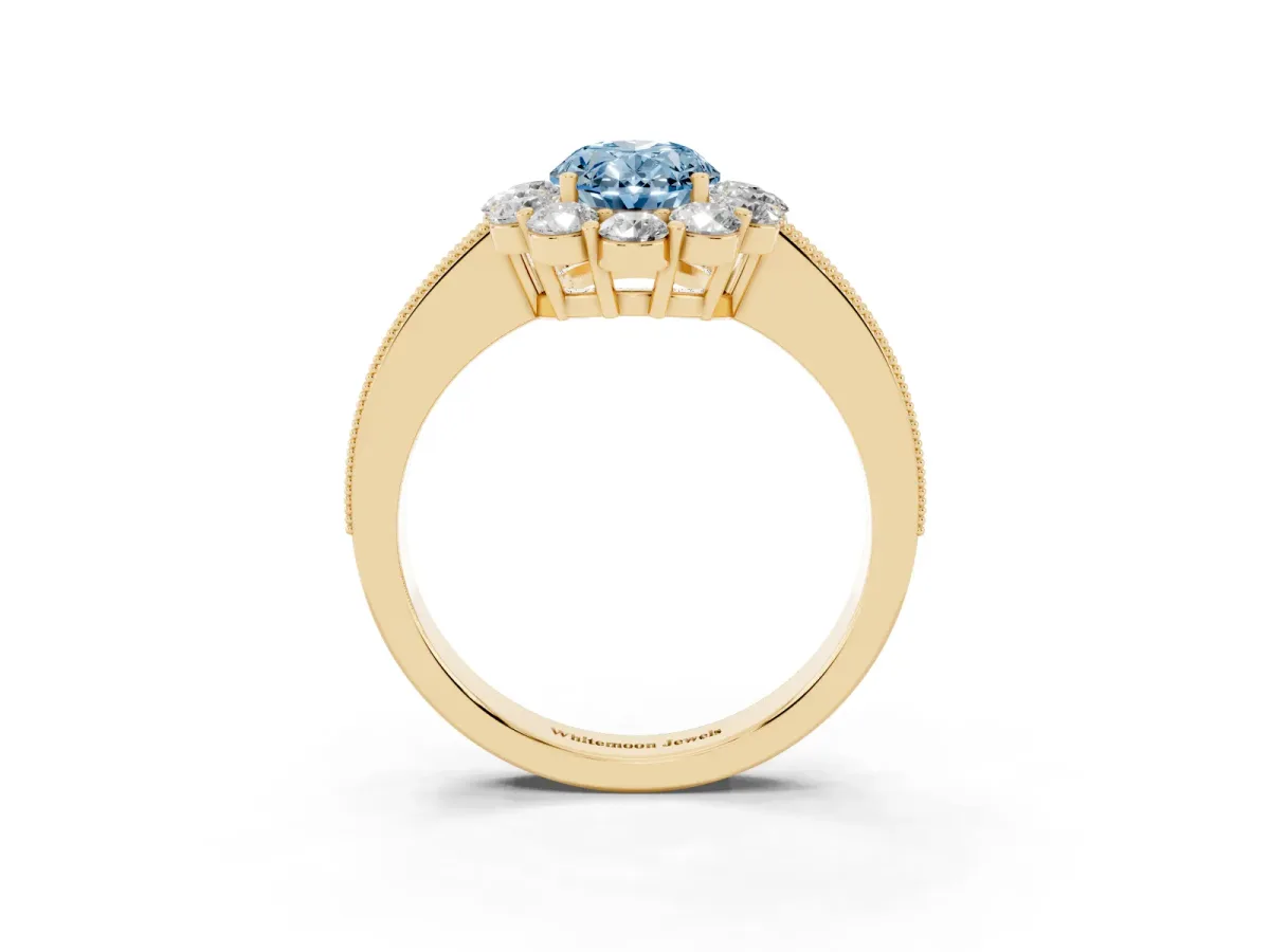 Fancy Blue Oval Cut Cut Halo Diamond Pavé Engagement Ring with Milgrain Detailing Yellow gold