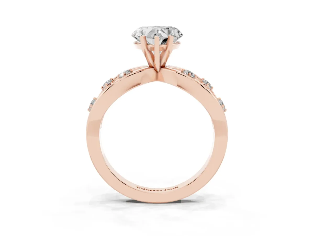 Heart Cut Cut Solitaire Diamond with Side Stones on Criss-Cross Band and Four-Prong Setting Rose gold
