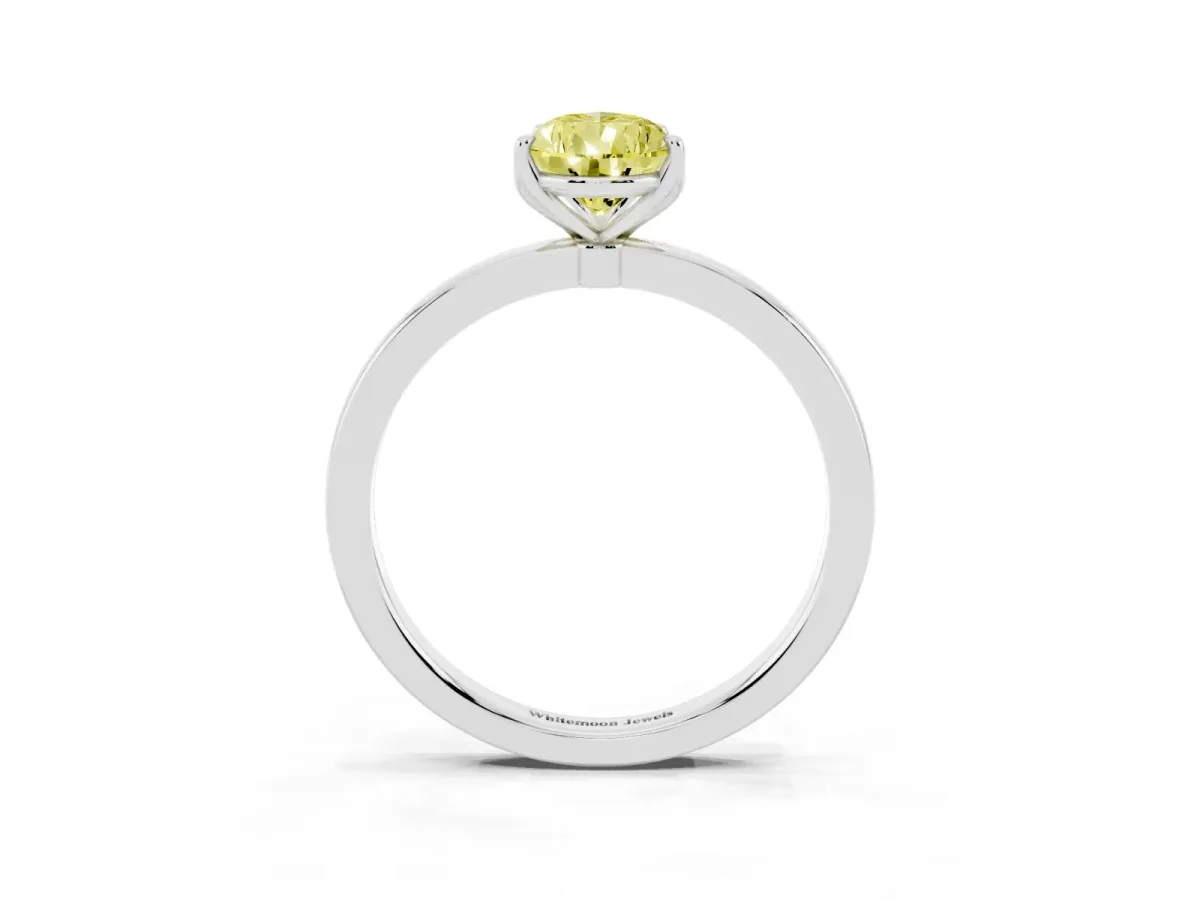 Fancy Yellow Pear Cut Diamond Solitaire Ring with Thin Band and Prong Setting Silver