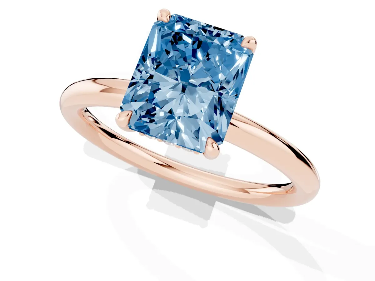 Fancy Blue Radiant Cut Diamond Solitaire Ring with Thin Band and Four-Prong Setting Rose gold
