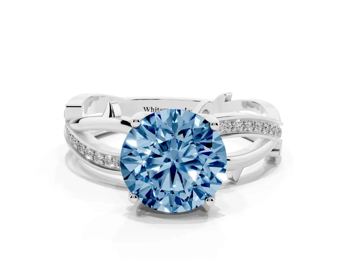 Fancy Blue Round Cut Solitaire Twist Band with Pavé Accents and Four-Prong Setting Platinum
