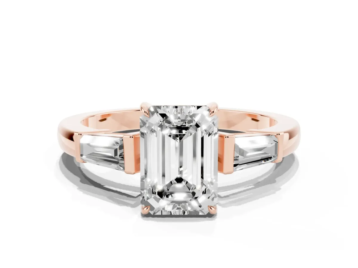Emerald Cut Diamond Three-Stone Ring with Tapered Baguette Side Stones and Prong Setting Rose gold